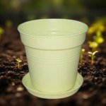 أصيص بلاستيك مقاس 11 سم بطبق تصريف ذاتي (أصفر)